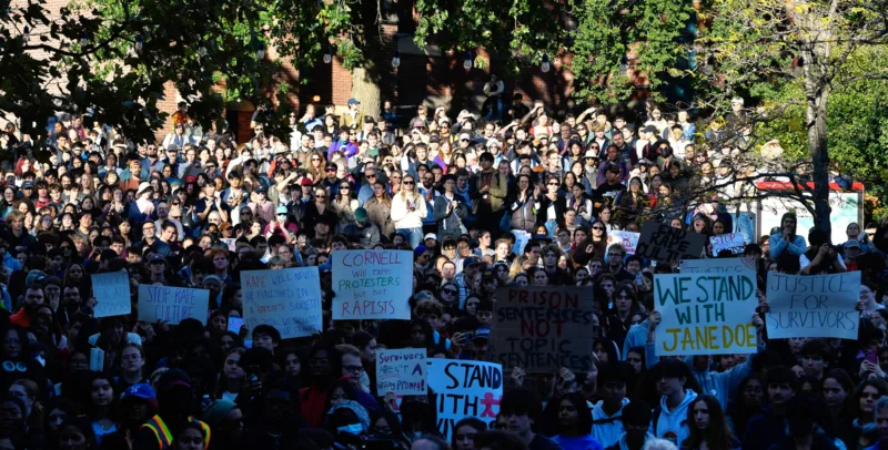 A crowd of students protests Cornell's response to gang rape complaint